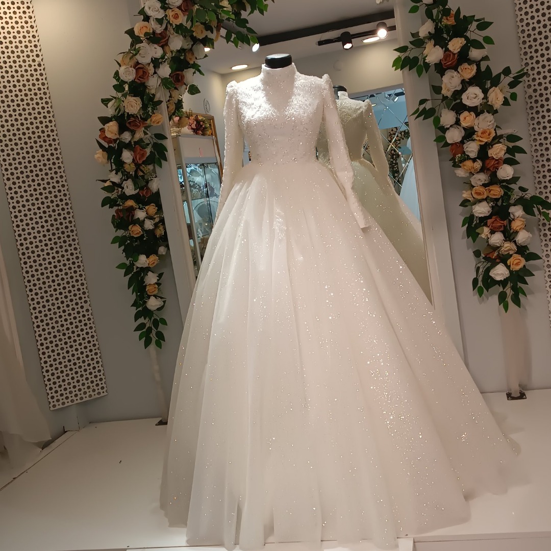 Uzun kollu simli tül kabarık etek gelinlik tasarımı